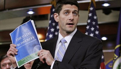 House Budget Chairman Ryan shows a copy of "The FY2013 Budget - The Path to Prosperity" during a news conference at Capitol Hill in Washington
